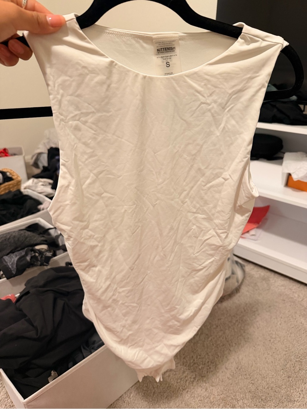 Kittenish White Sleeveless Scoop Neck Bodysuit